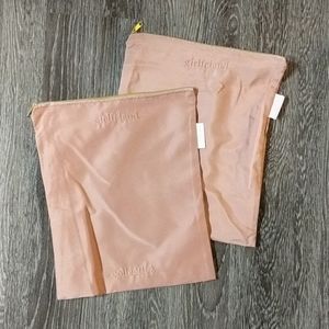 2 pouches from Girlfriend Collective